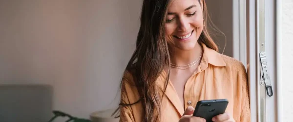 woman happy with public mobile referral code promotion